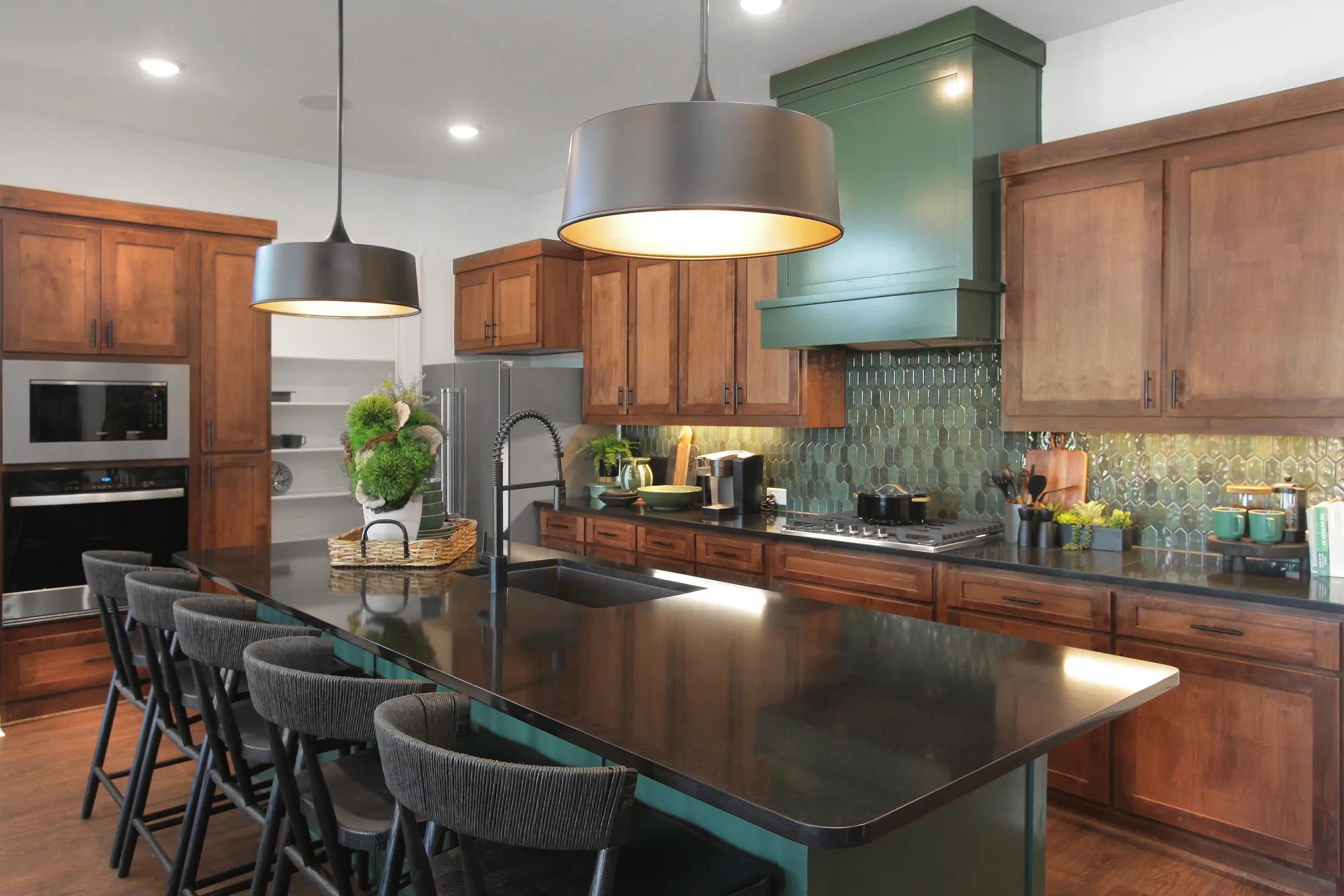 Drees home kitchen with dark wood cabinets