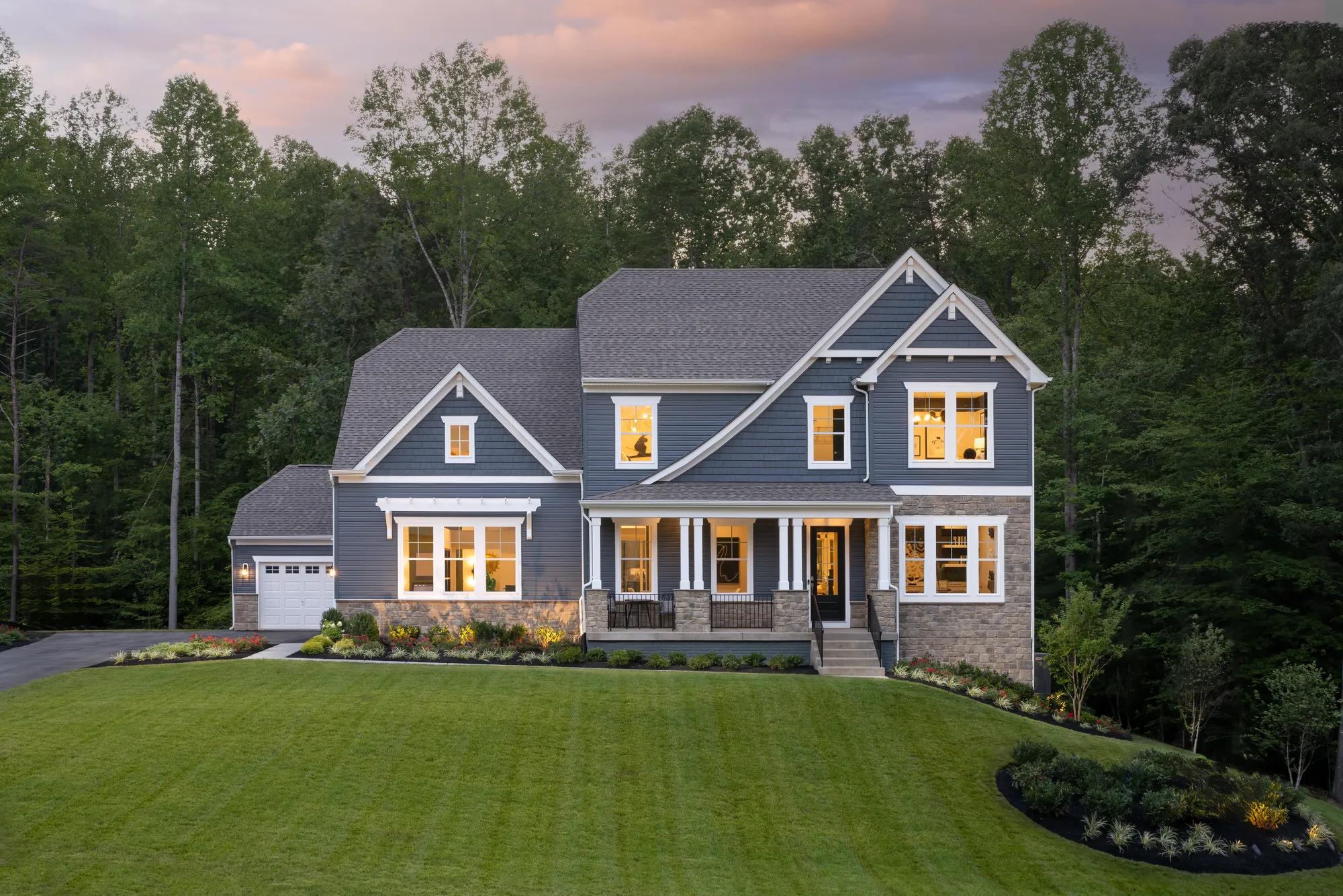 custom two-story home with stone and shakes