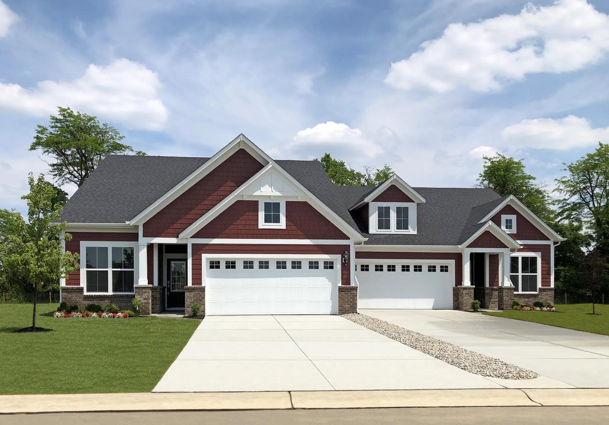 paired villa home with brick, siding and shakes