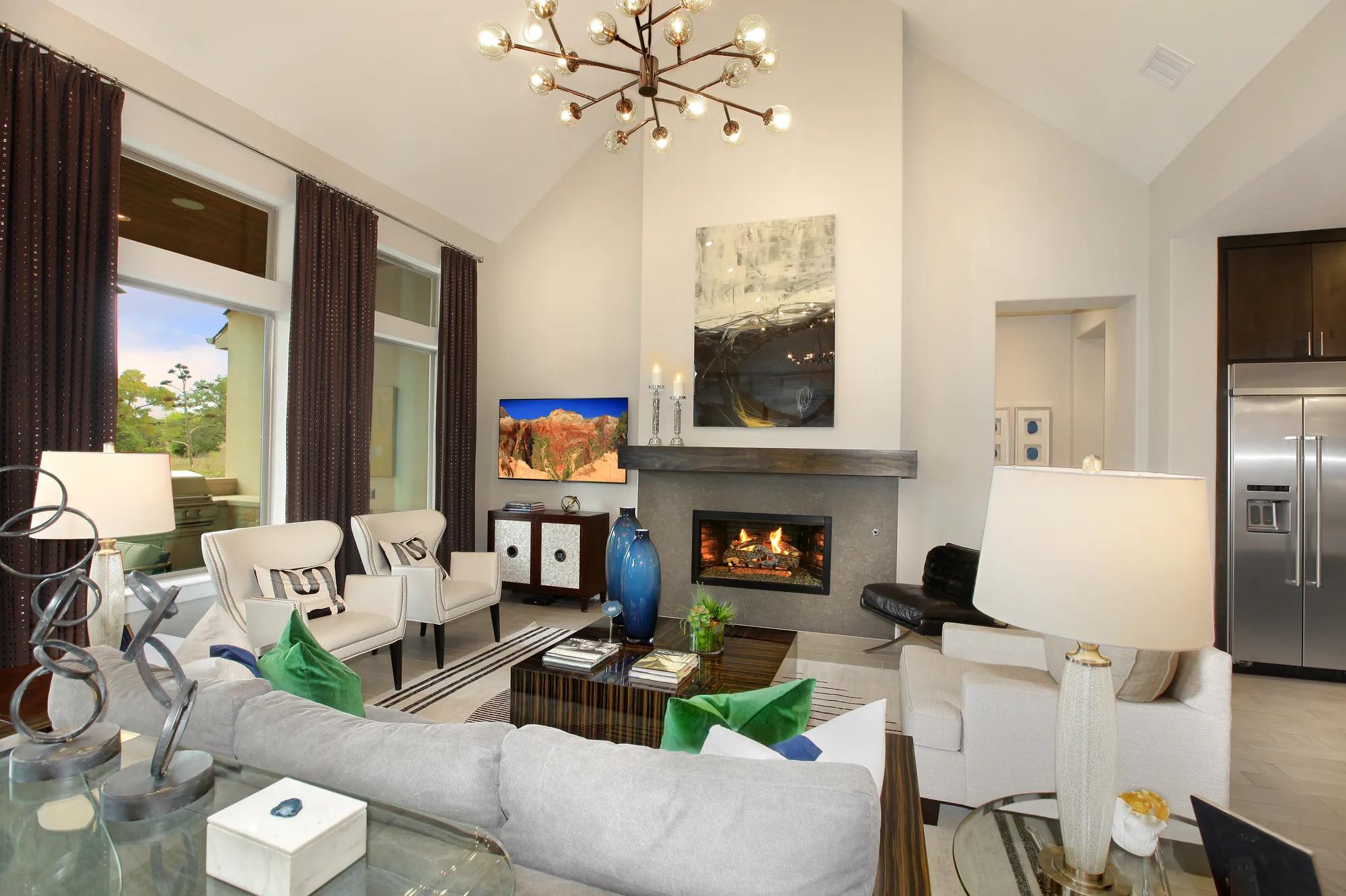 dining table overlooking sofas and fireplace