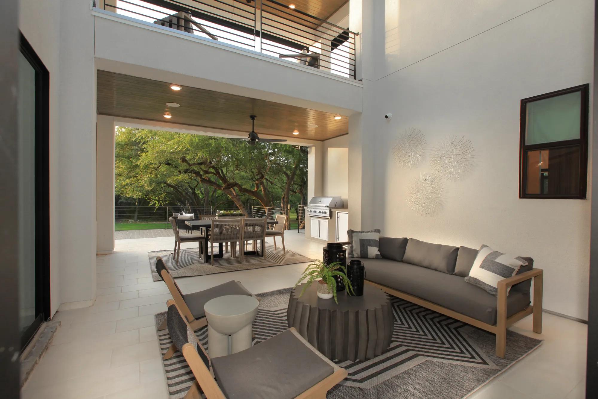 two-story courtyard with sitting area