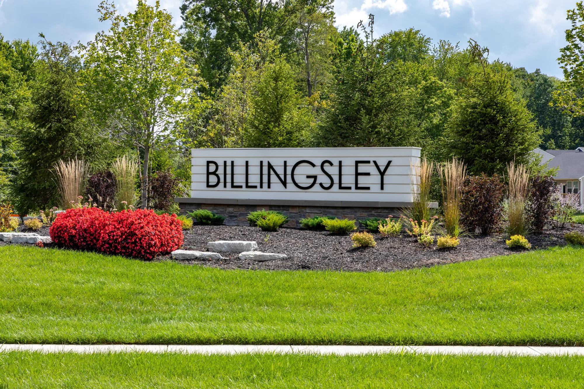community entrance monument surrounded by landscaping