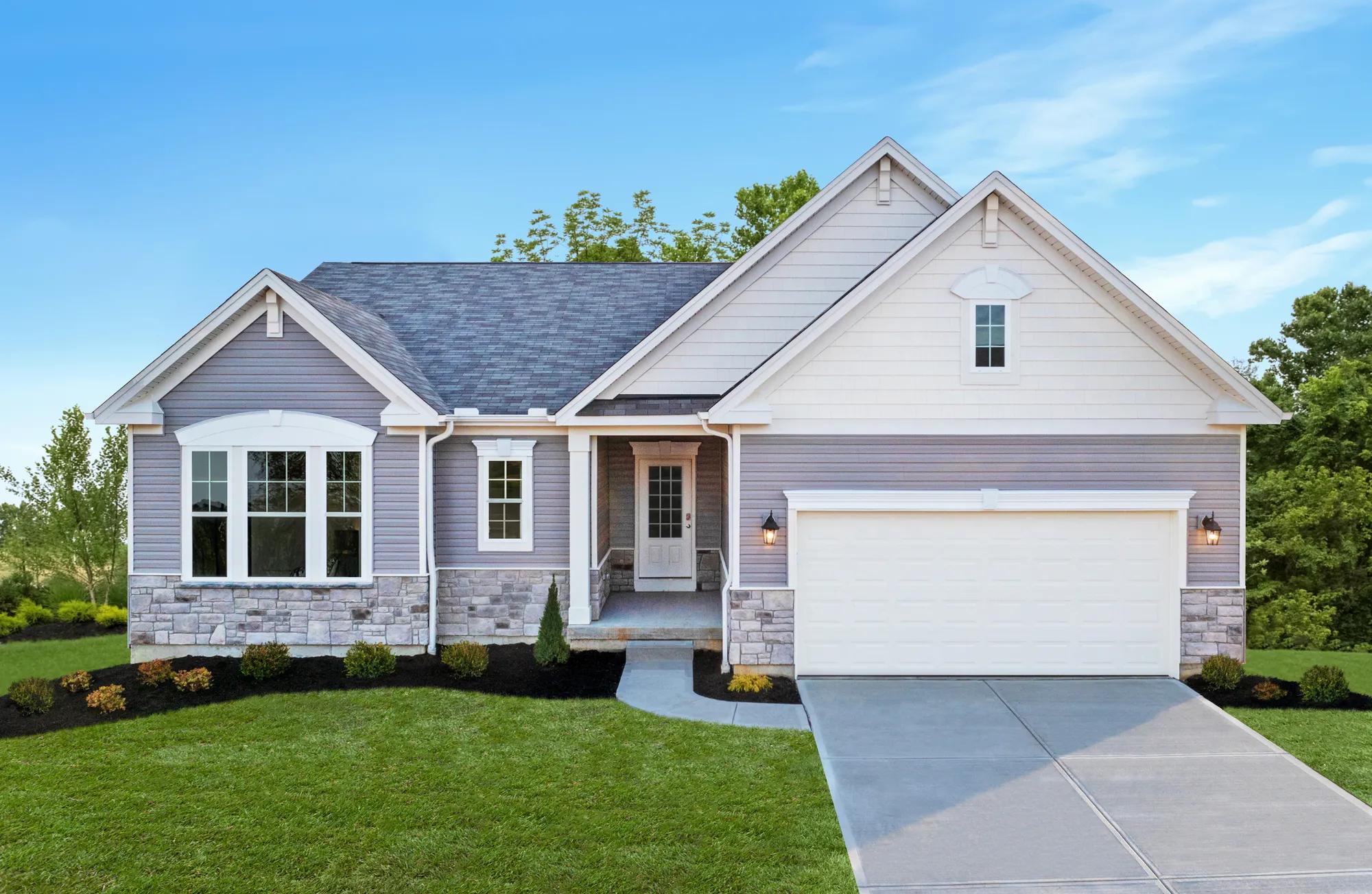custom home with stone and siding