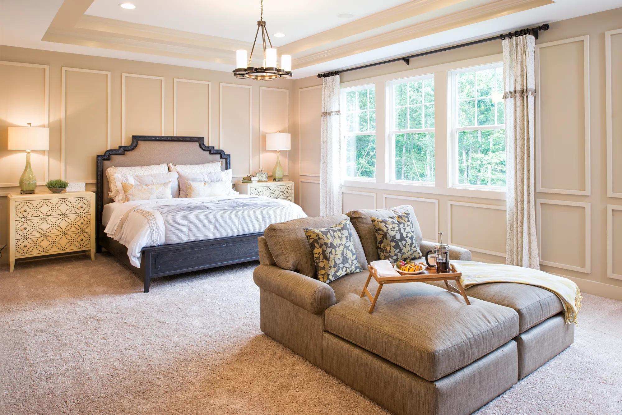 Primary Suite with dual tray ceiling and sitting area