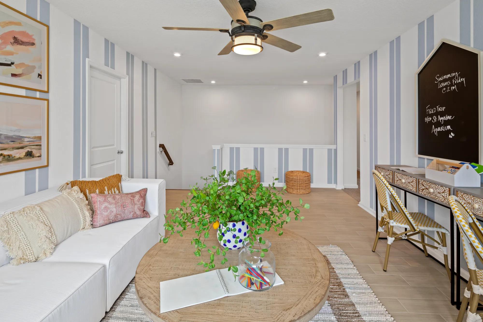 bonus room with blue striped walls