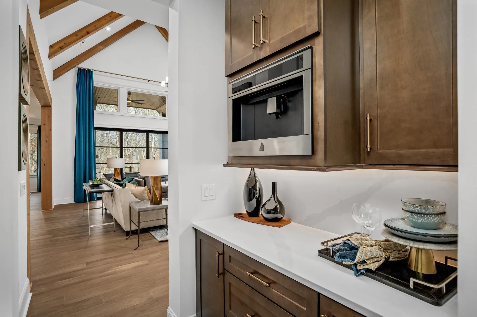 butler's pantry with light wood cabinets
