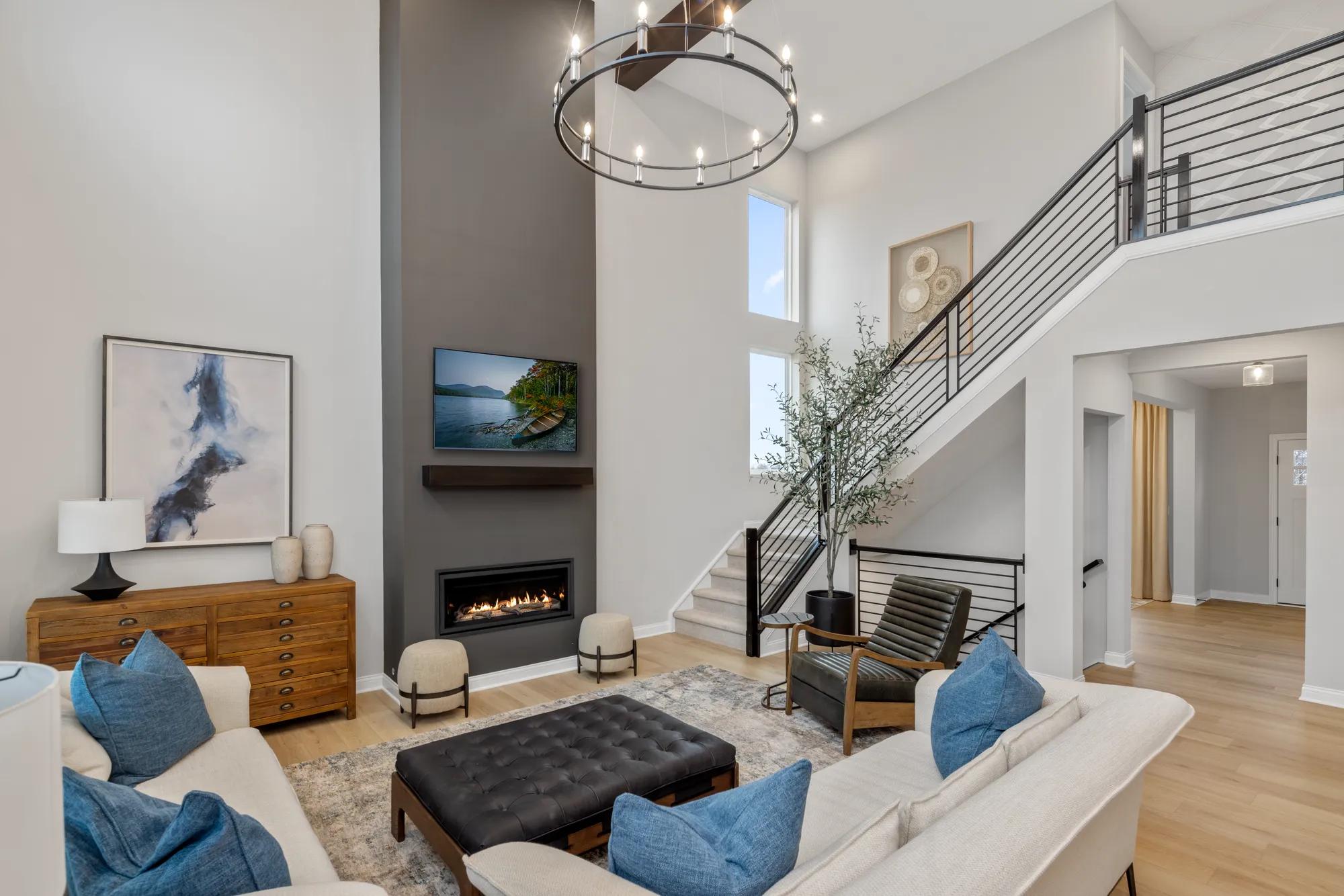 two-story family room with staircase