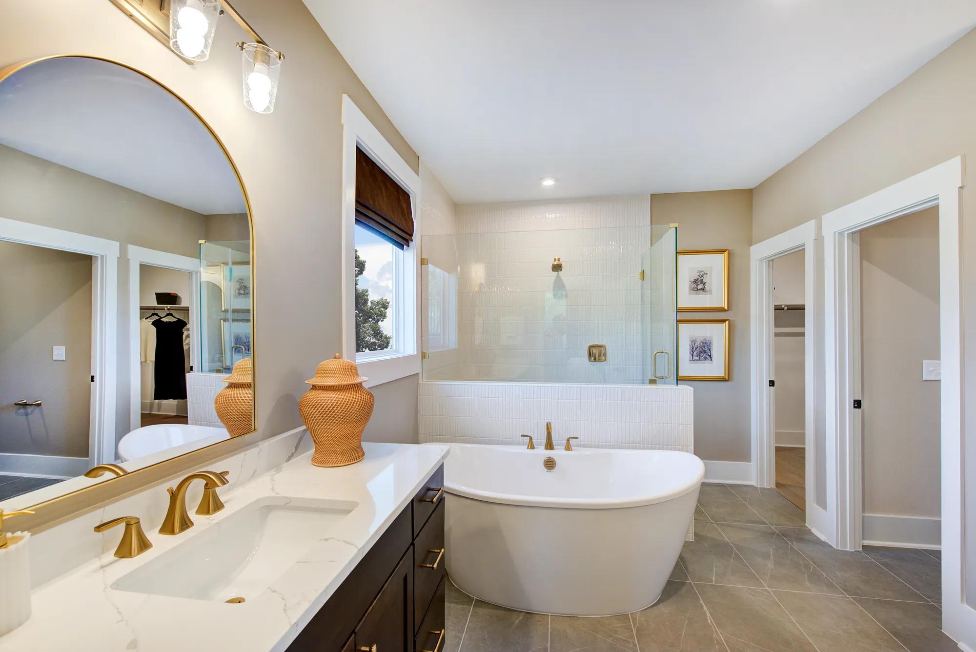 Custom home primary bathroom with freestanding tub