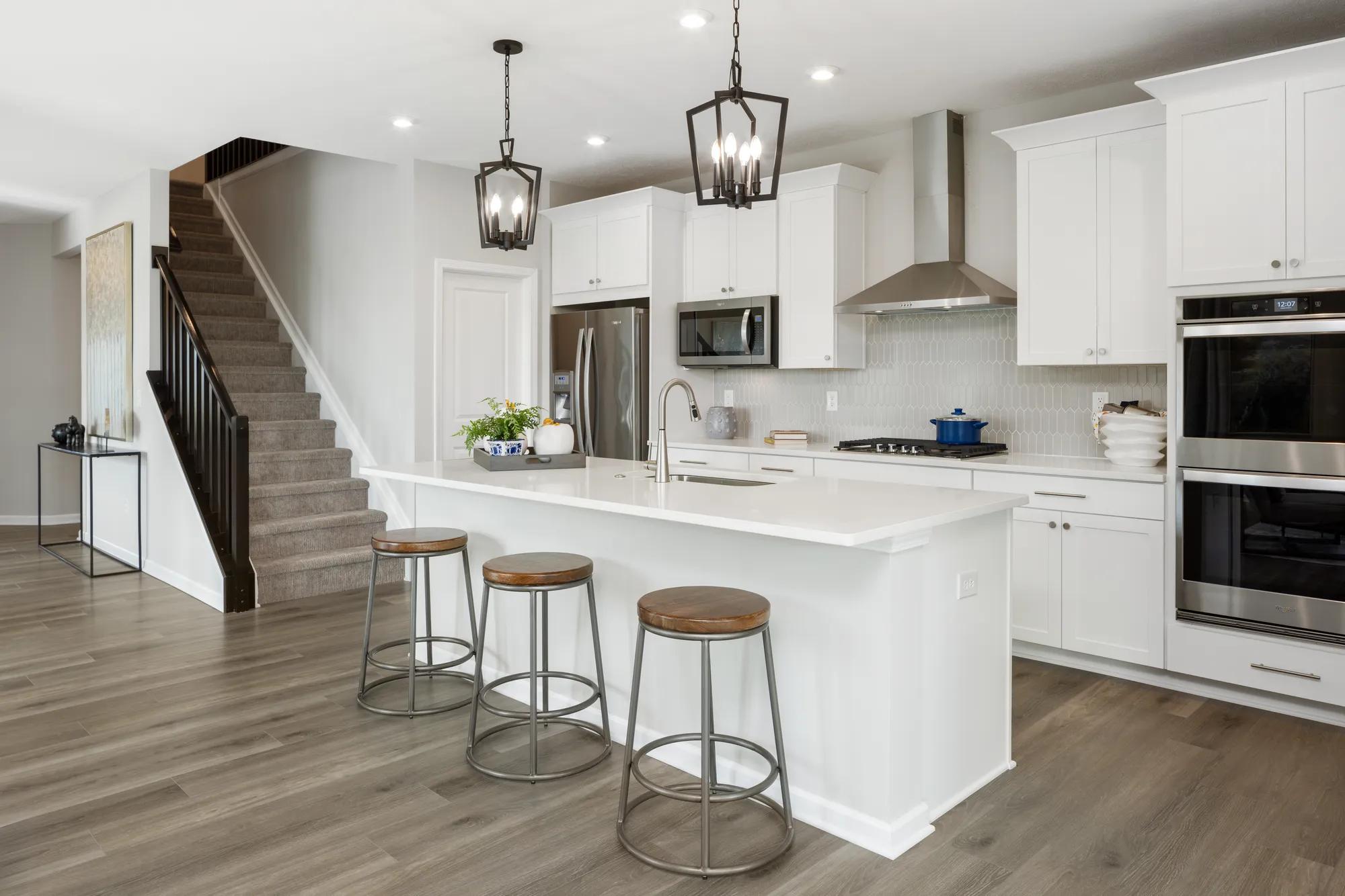 new kitchen with white cabinets