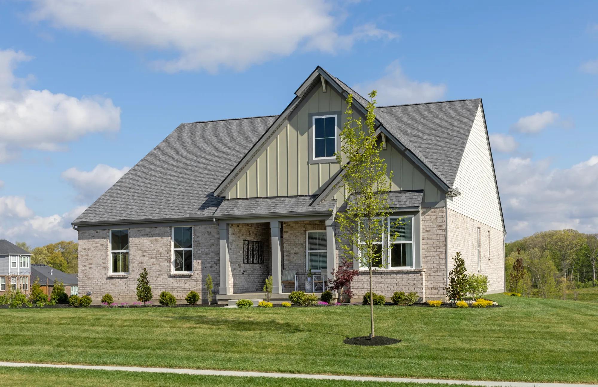 new home with brick, and board and batten