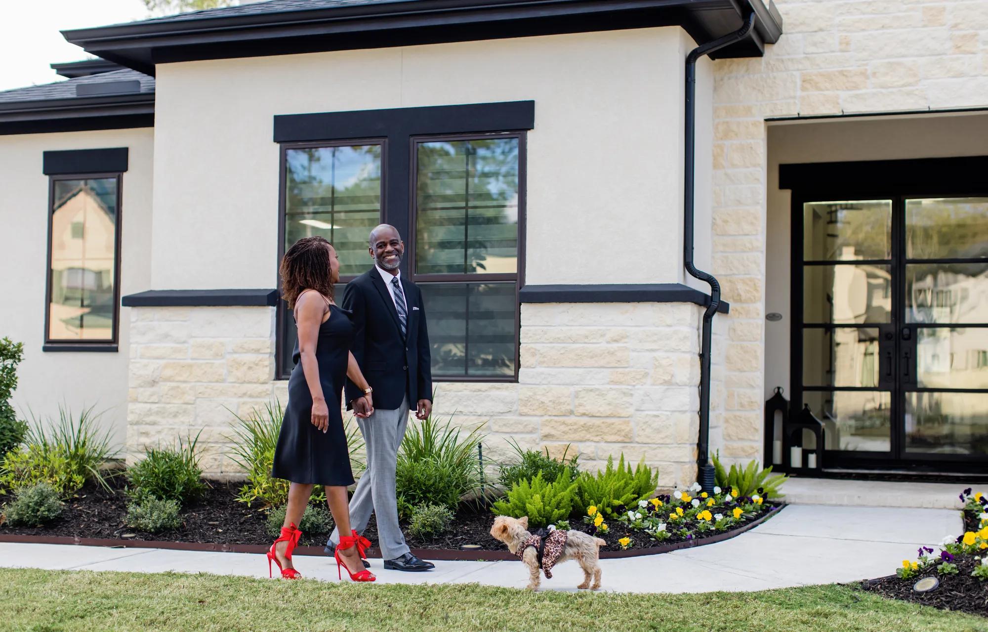 New homeowners enjoying their beautiful brick Drees Home