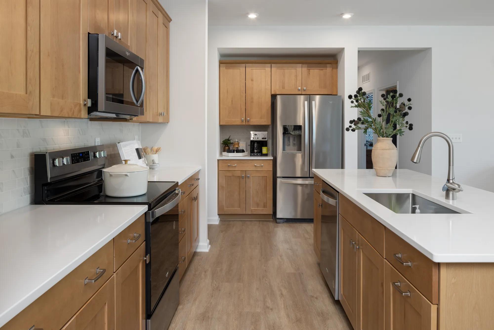 new kitchen with stainless steel appliances