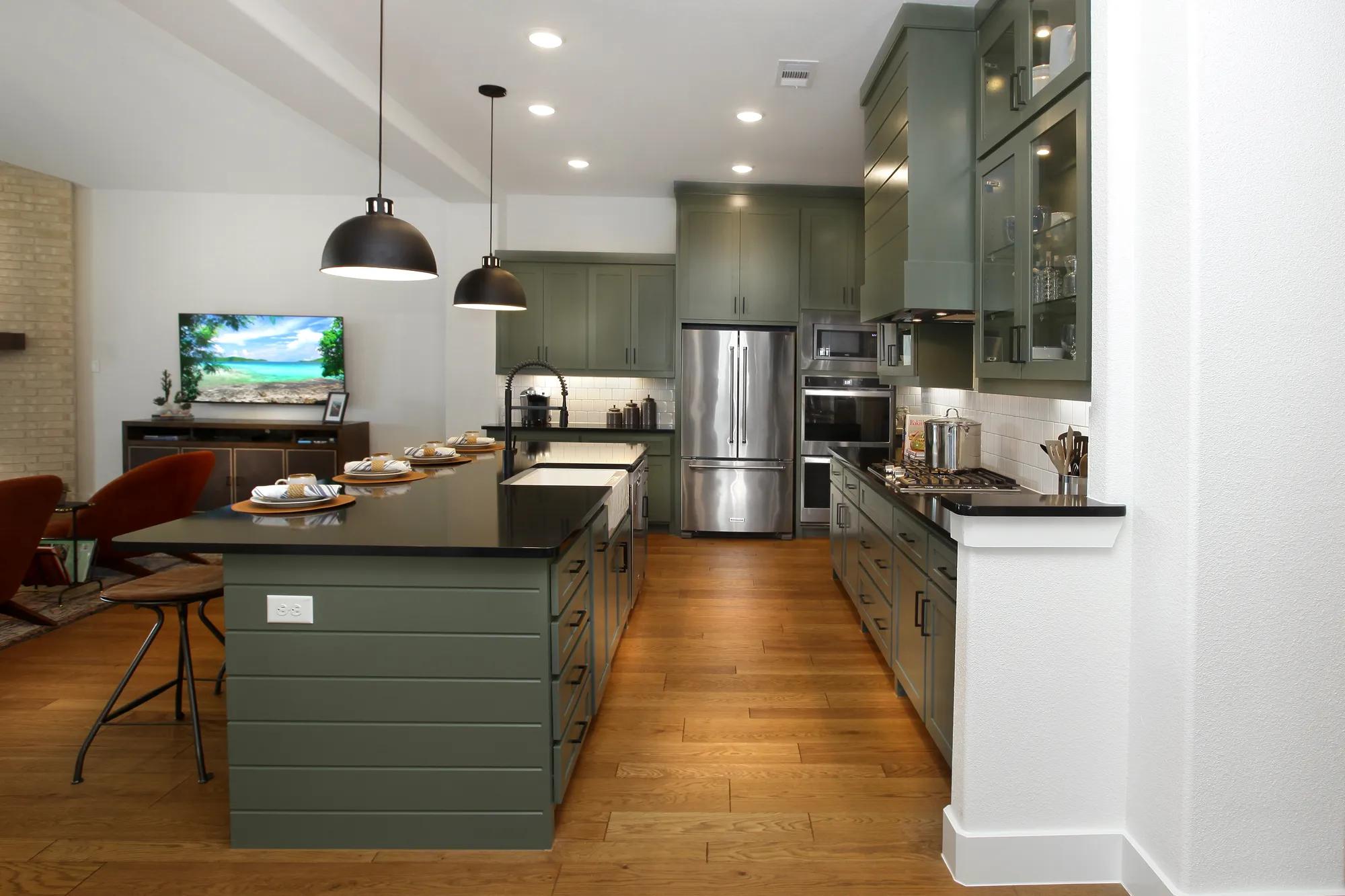 kitchen with painted cabinets and stainless steel appliances