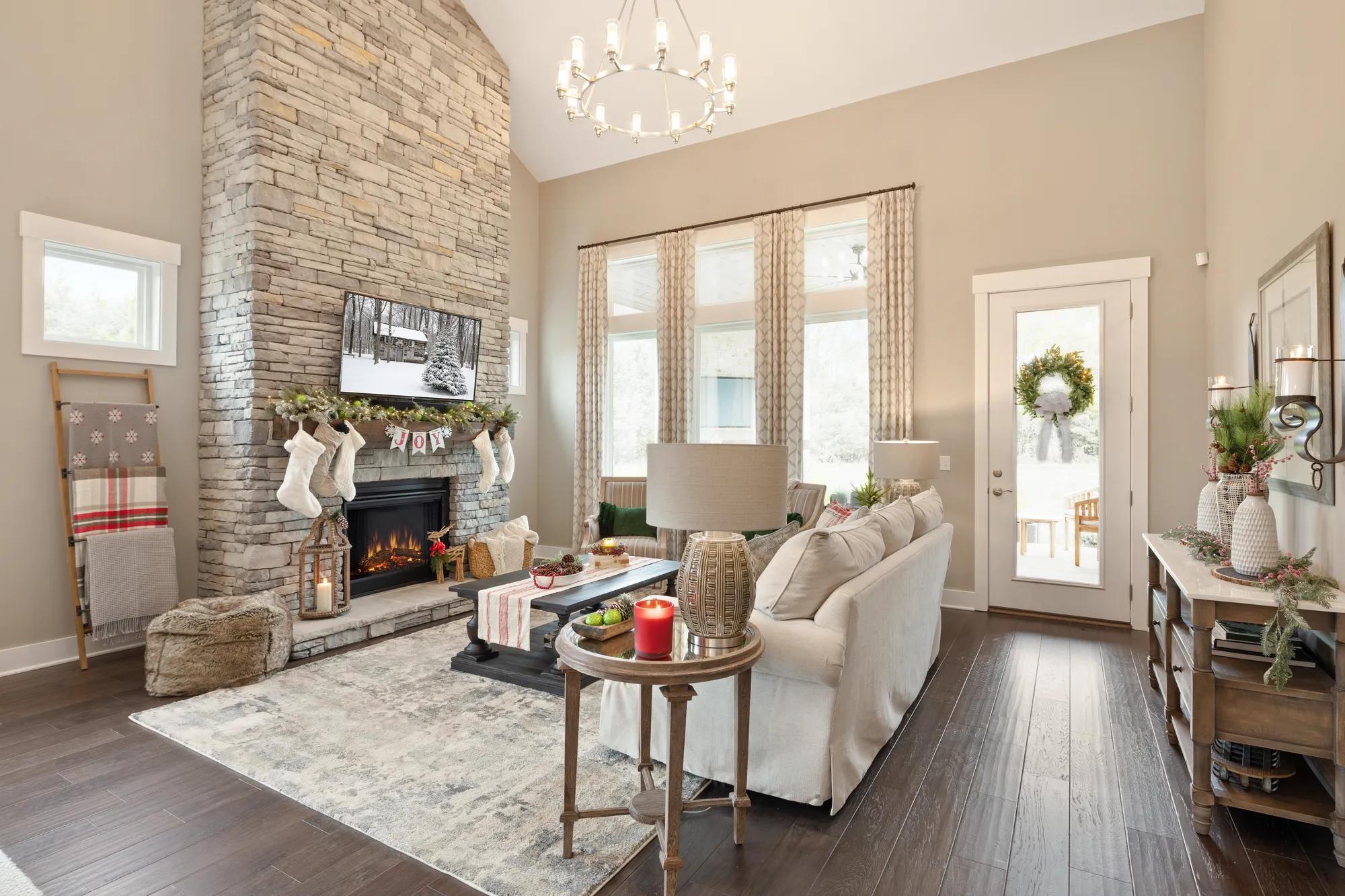 A gorgeous family room with holiday decorations in a custom home