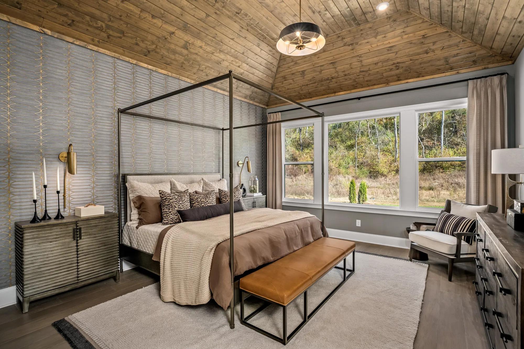 primary bedroom suite with vaulted ceiling