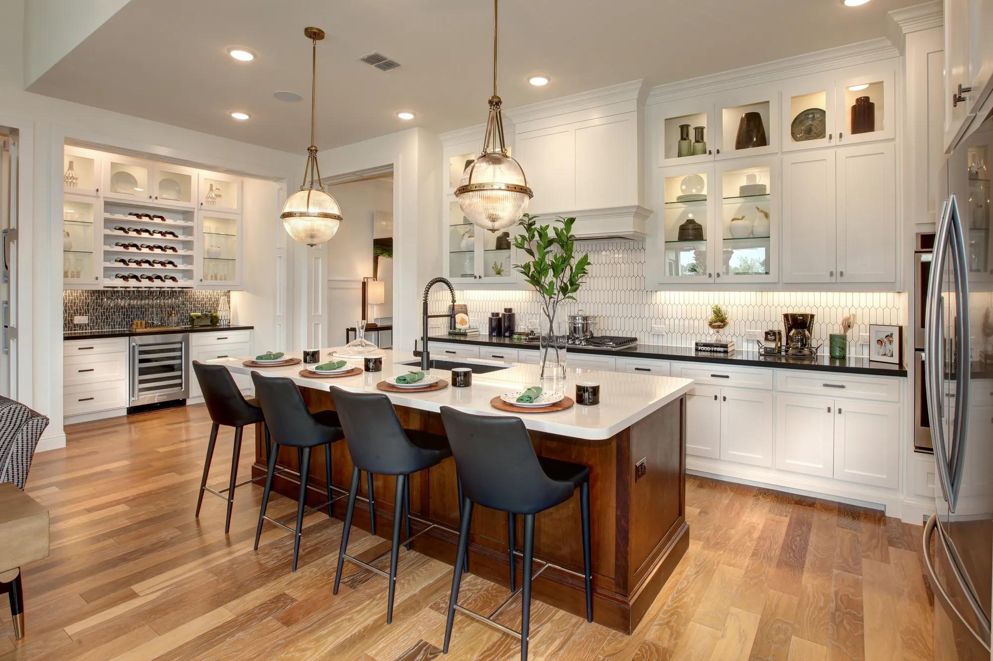 Kitchen with white cabinets and hardwood floor