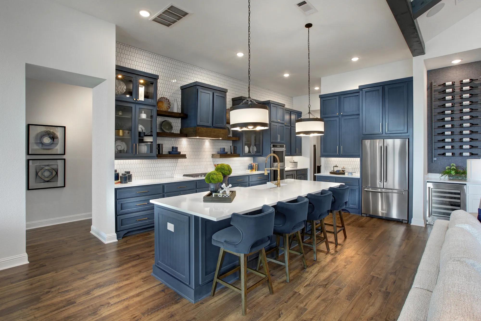 Kitchen with dark blue cabinets