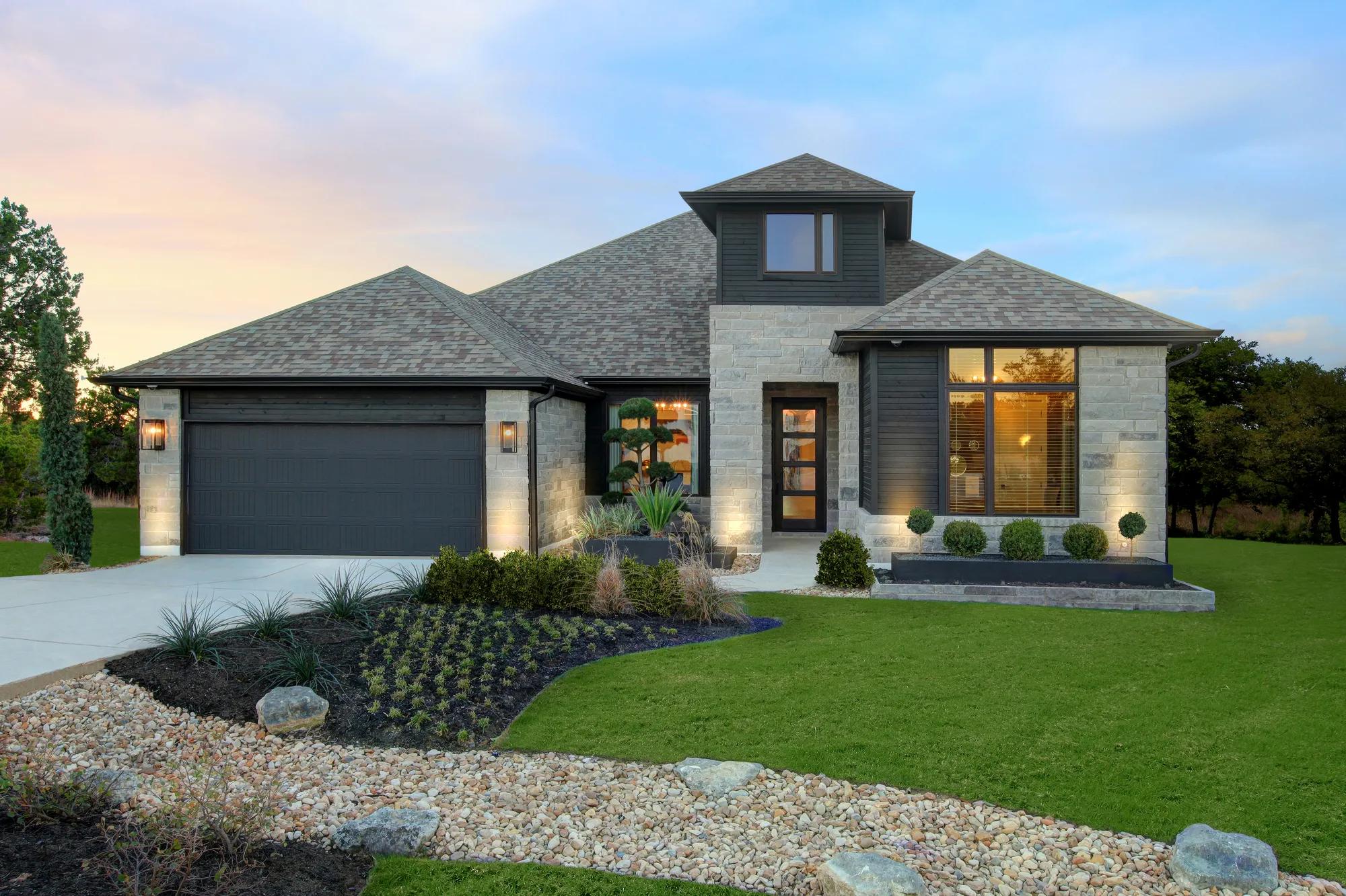 new home with stone and stucco exterior