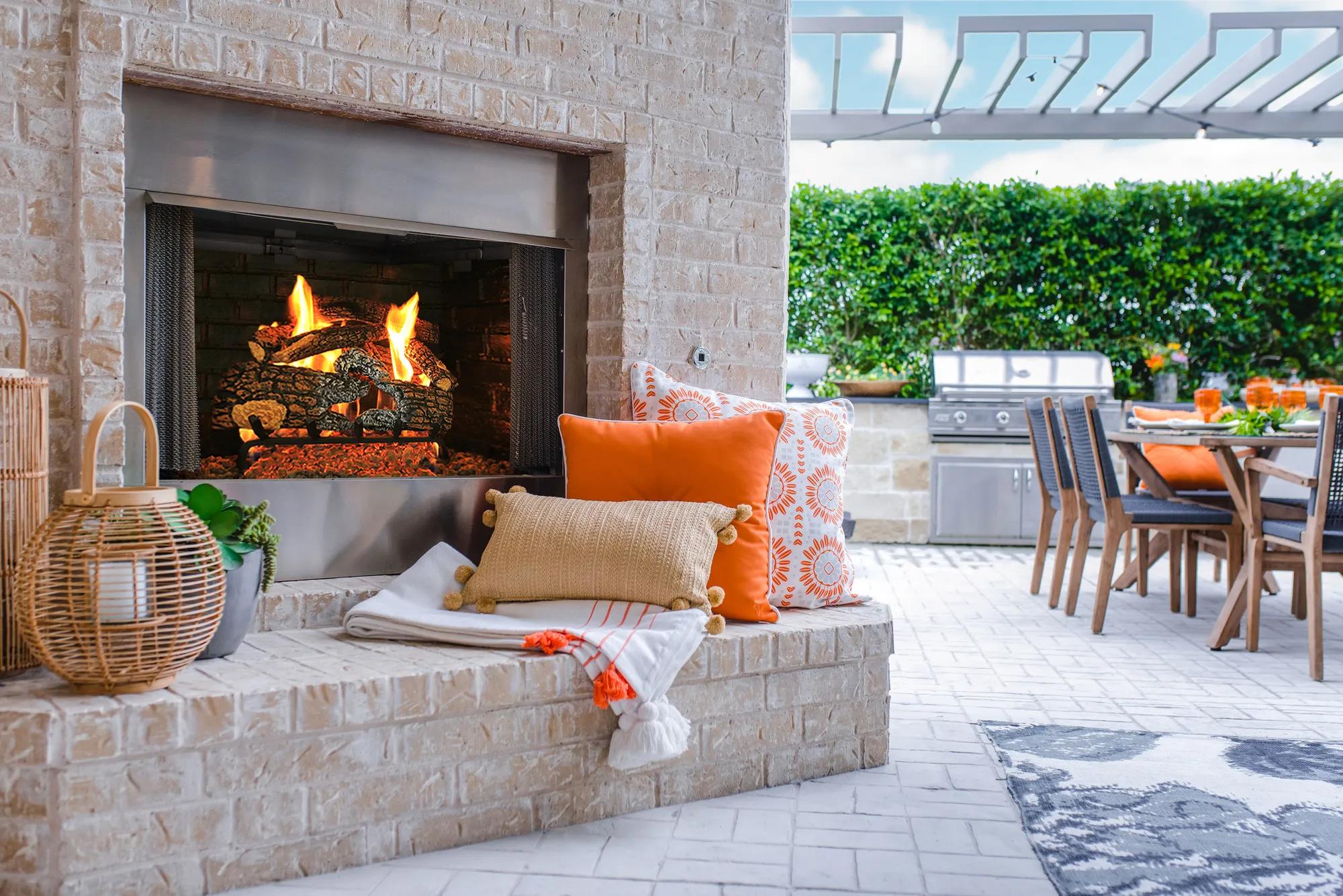 Cozy outdoor fireplace at a custom home