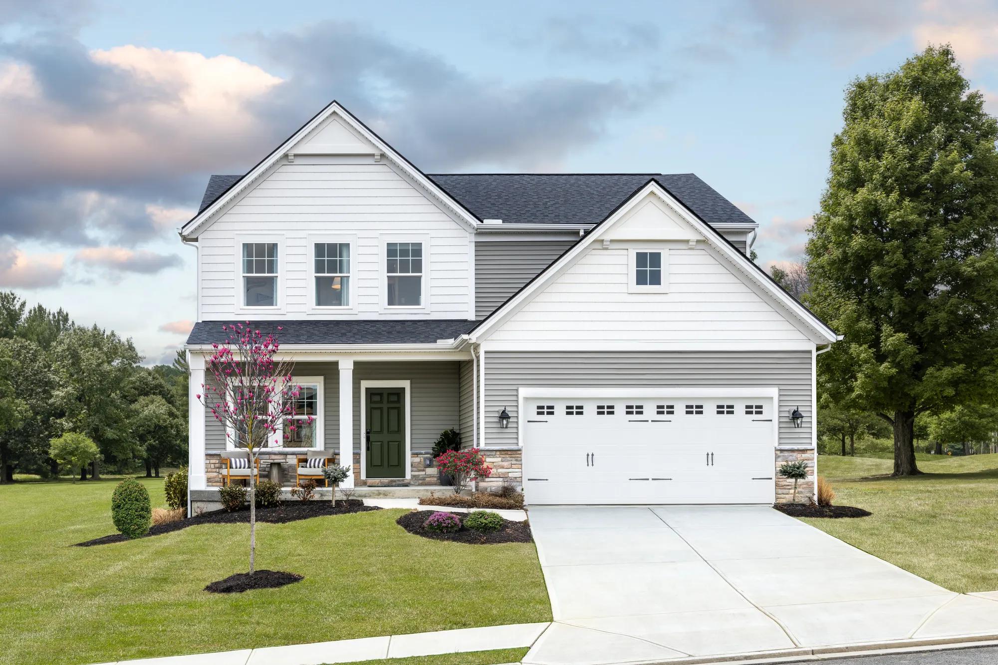 New construction two-story home with covered front porch