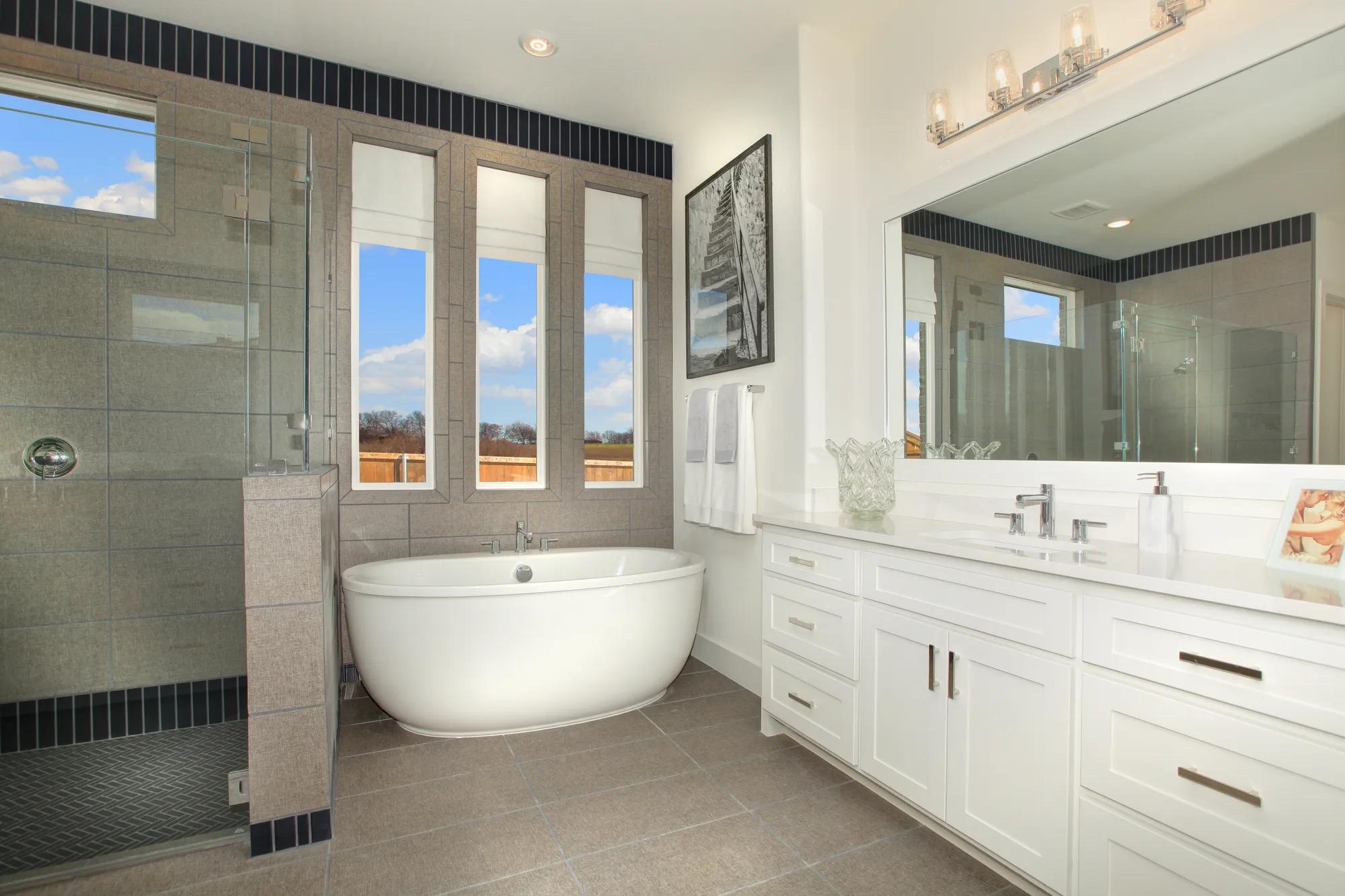 Primary Bathwith freestanding tub and glass shwoer
