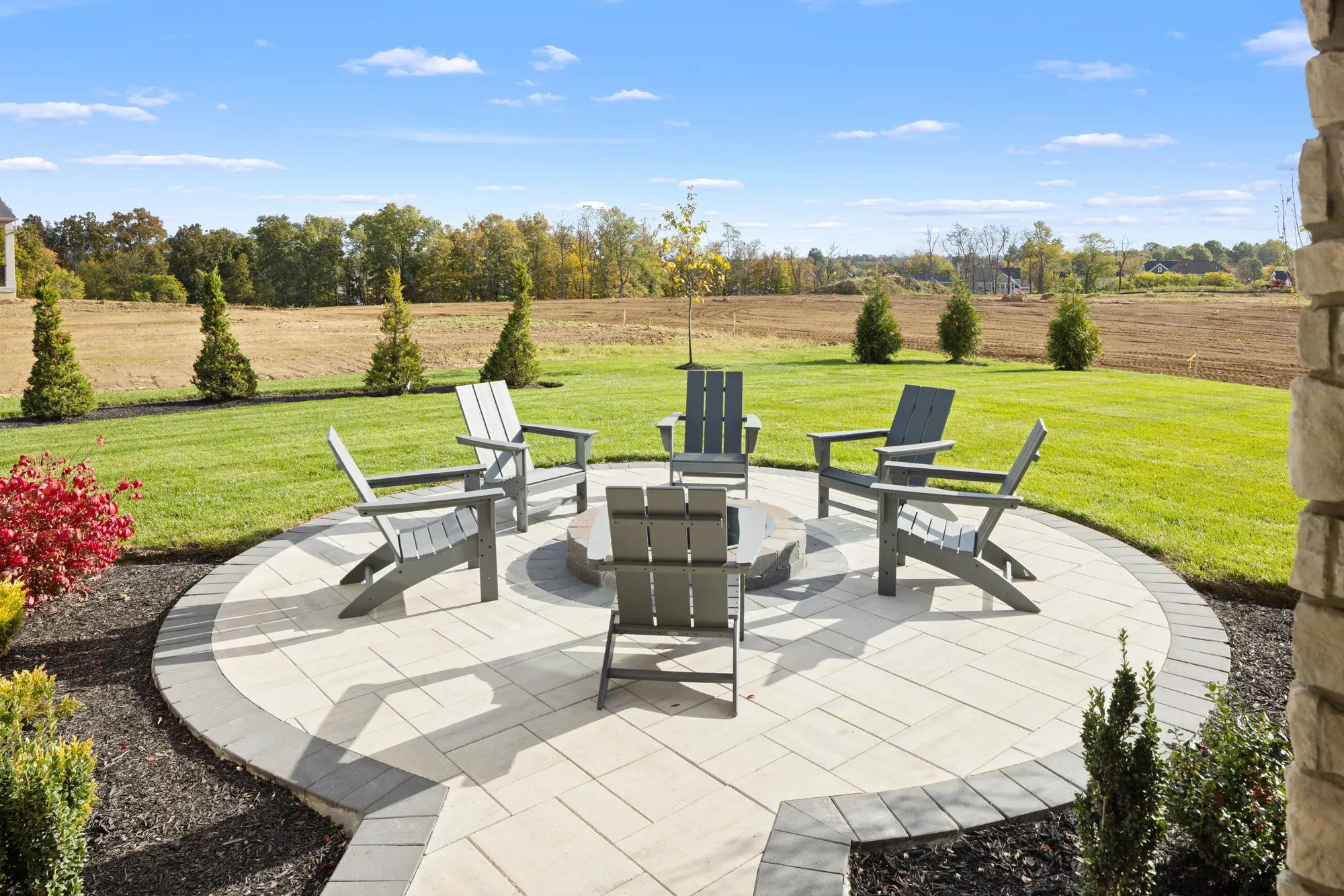 custom outdoor patio with firepit
