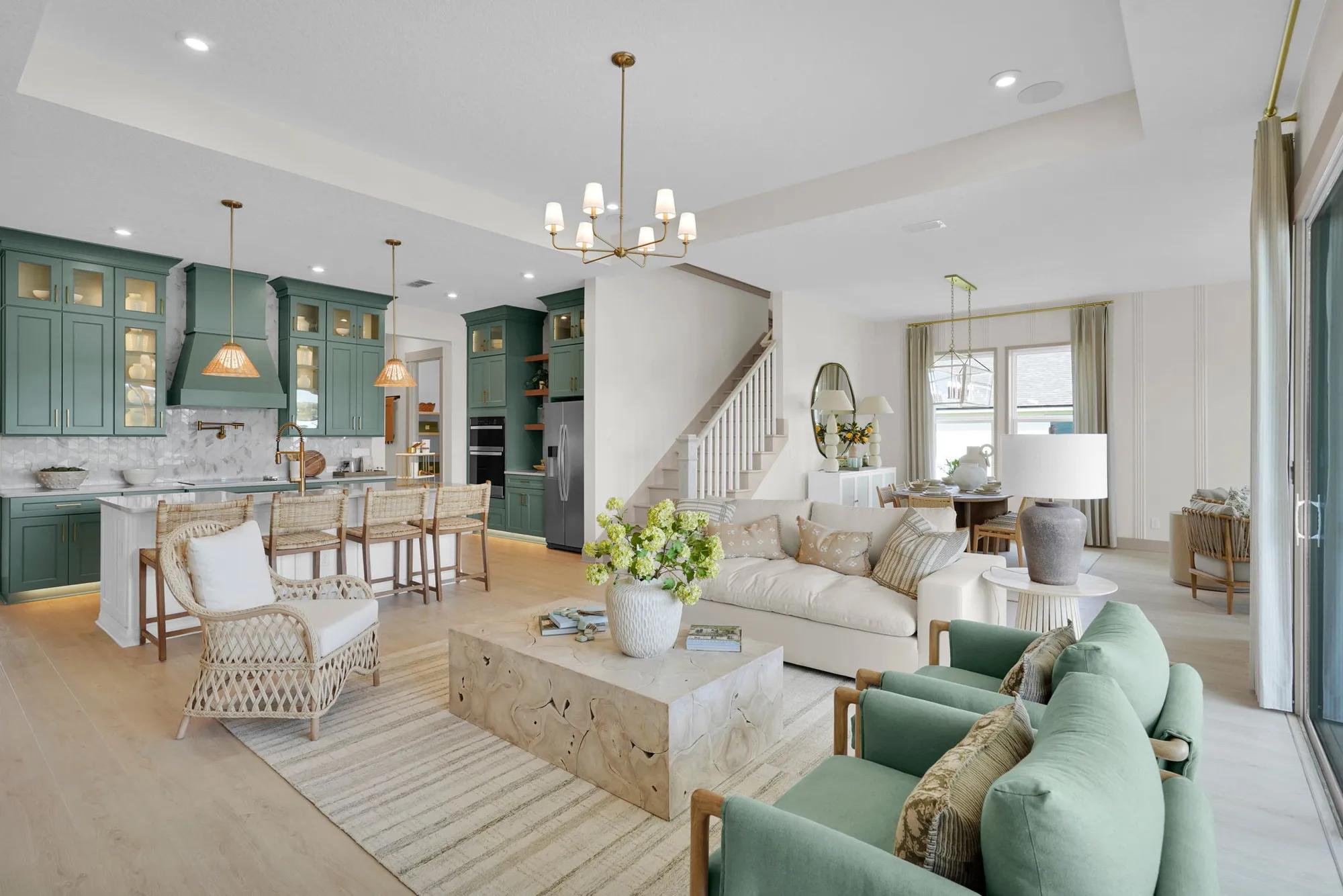 Custom home open floor plan kitchen, family room, dining with hardwood floors