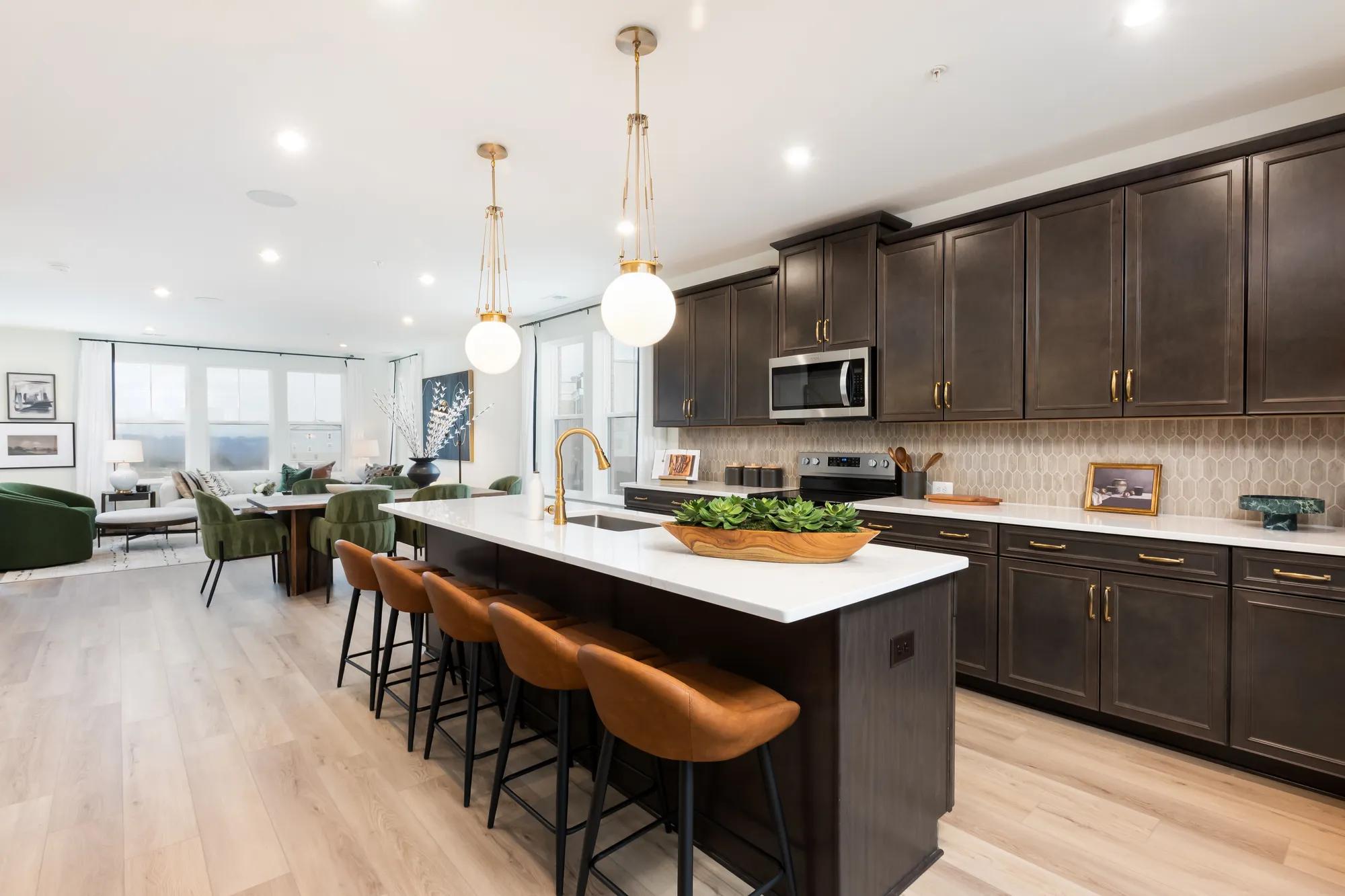 New construction townhome open floor plan kitchen, dining, and family room