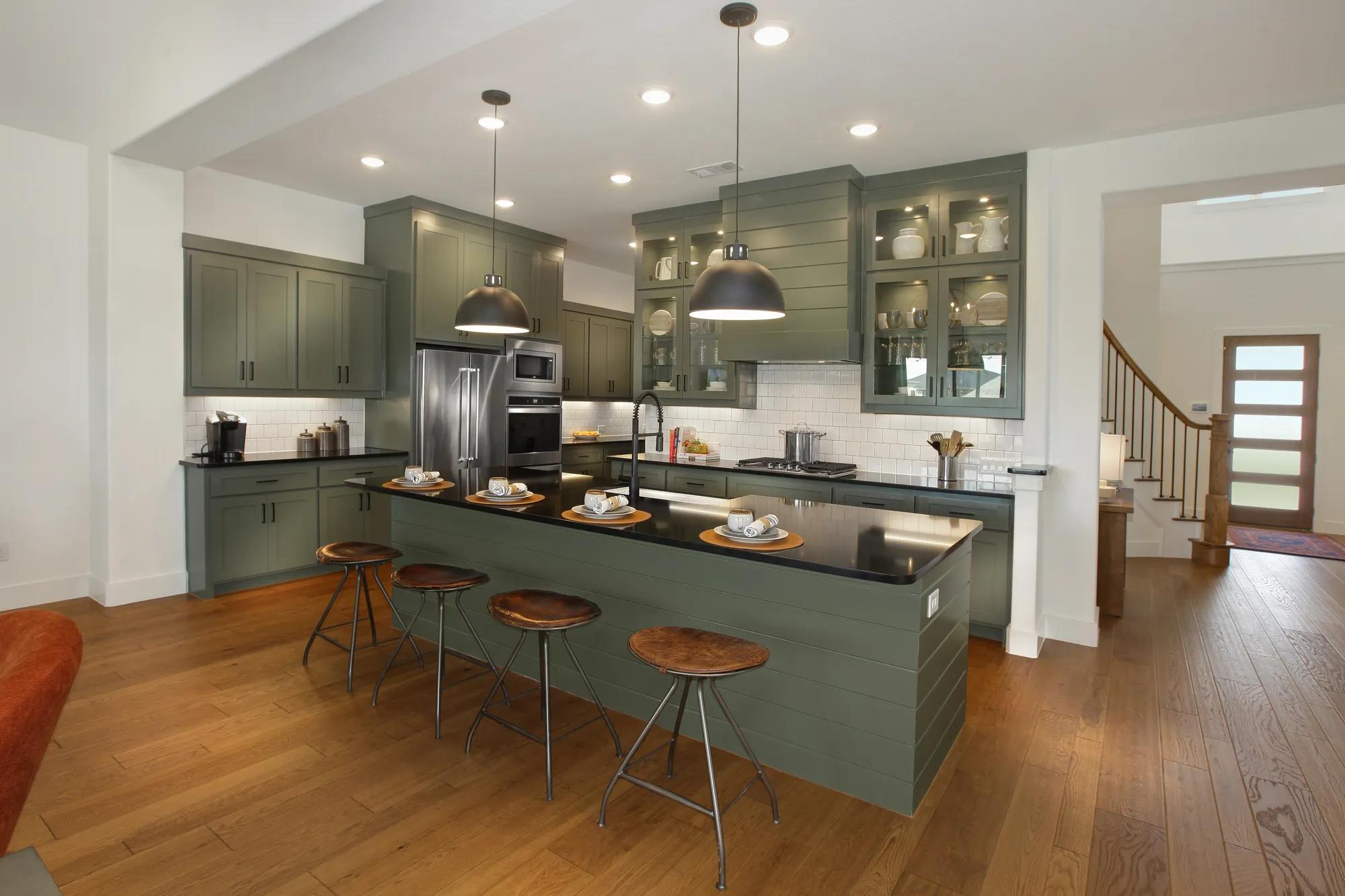 kitchen with green cabinets